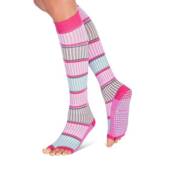 Alternating pink, blue and grey stripes on knee high grippy socks
