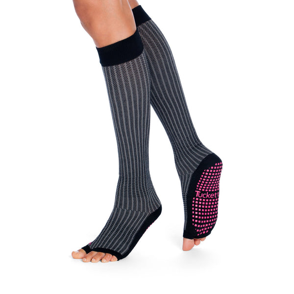 Knee high grip socks with light grey vertical lines on a dark grey base
