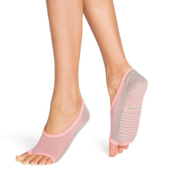 light grey open toe socks with peach geometric overlay and peach grips on the bottom